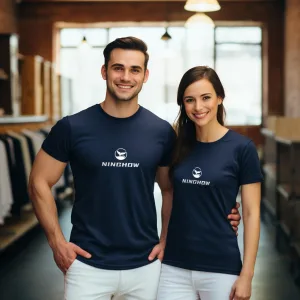Two people modeling branded t-shirts indoors.