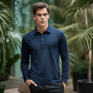 Man in navy polo shirt posing outdoors