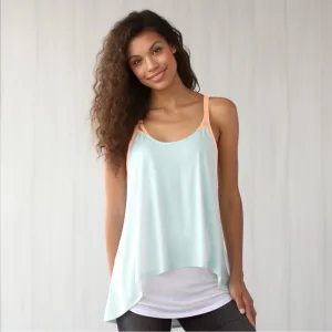 flowy tank tops for women c Woman in stylish pastel tank top.