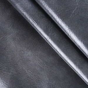 genuine leather Close-up of textured black leather material.