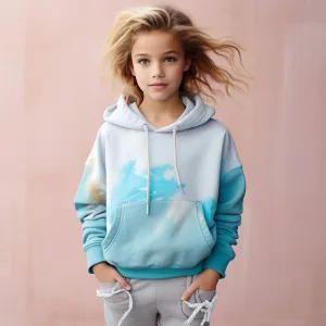 Young girl in stylish blue hoodie and grey pants