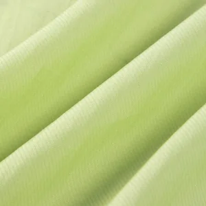 Close-up of green textured fabric material.