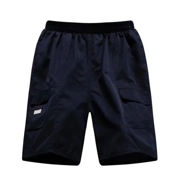 Navy blue cargo shorts, casual wear, isolated.