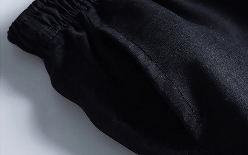 beach volleyball shorts 8 jpg Black elastic waist trousers close-up