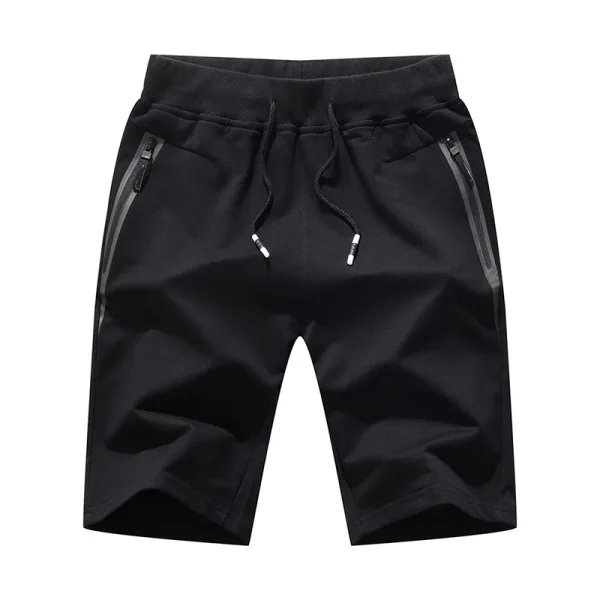 Black athletic shorts with zipper pockets.
