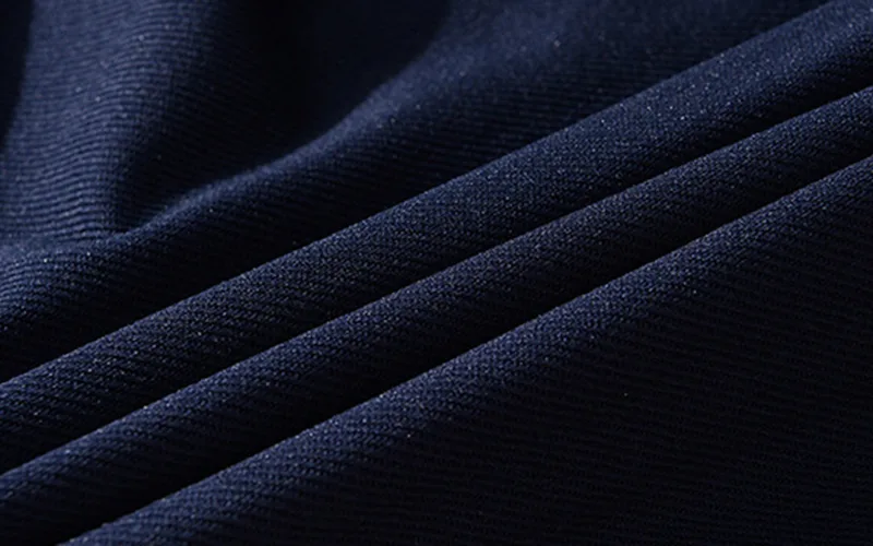 shorts for the beach 10 jpg Close-up of textured navy blue fabric.