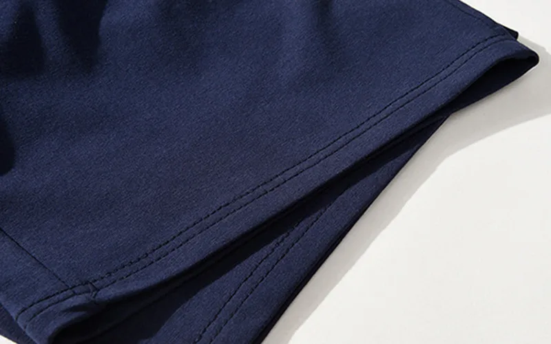 shorts for the beach 11 jpg Close-up of navy blue garment fabric detail.