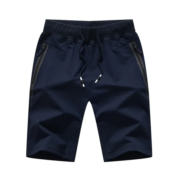 Navy blue athletic shorts with zip pockets.