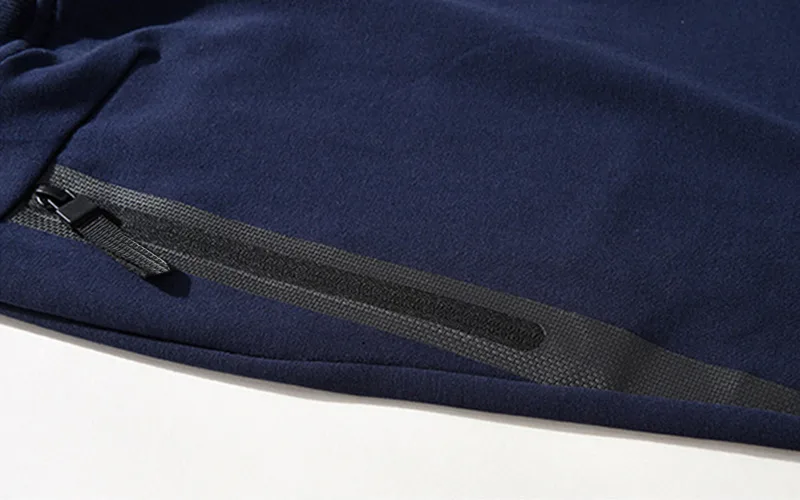 Close-up of navy hoodie with zipper detail