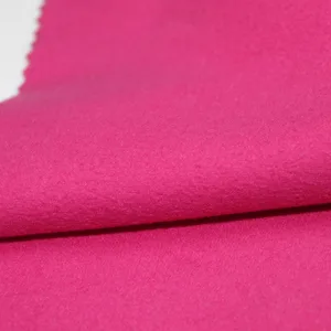 Close-up of pink felt fabric texture.