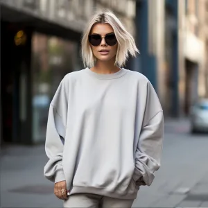 Woman in sunglasses wearing casual streetwear.