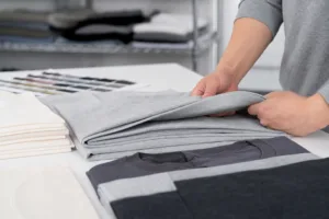 heavyweight vs lightweight t-shirts fabric comparison on a sampling table
