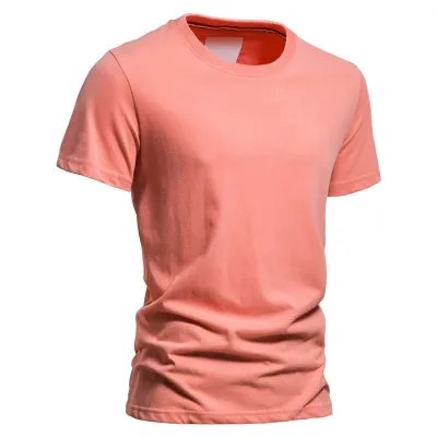 Coral pink crew-neck t-shirt on white background.
