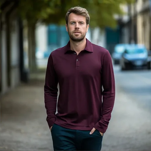 Man in maroon polo shirt walking on street.