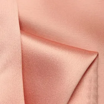 Close-up of pink textured fabric material.